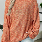 Women's waffle-textured sweater with a relaxed fit