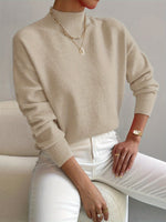 Pull-over femme à col montant et poignets côtelés