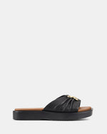 Ivorina – Schwarze Sandalen Mit Wellen Sohle Goldene Schnalle