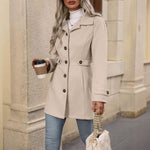Tailored women's herringbone coat with button closure and pockets