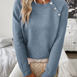 Women's sweater with pearl buttons and a crew neck