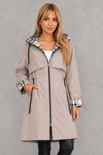 Veste de pluie pour femme avec capuche et coupe cintrée