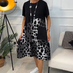 Emeline - Vestido largo estampado com decote redondo e mangas curtas