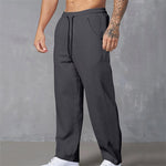 Pantaloni a coste con coulisse e tasche laterali
